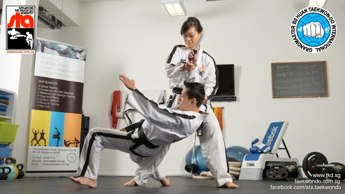 Orchard Central Taekwondo Self Defence Classes Senior Instructor Victor Ang Anjanette Huan Grandmaster BS Huan International